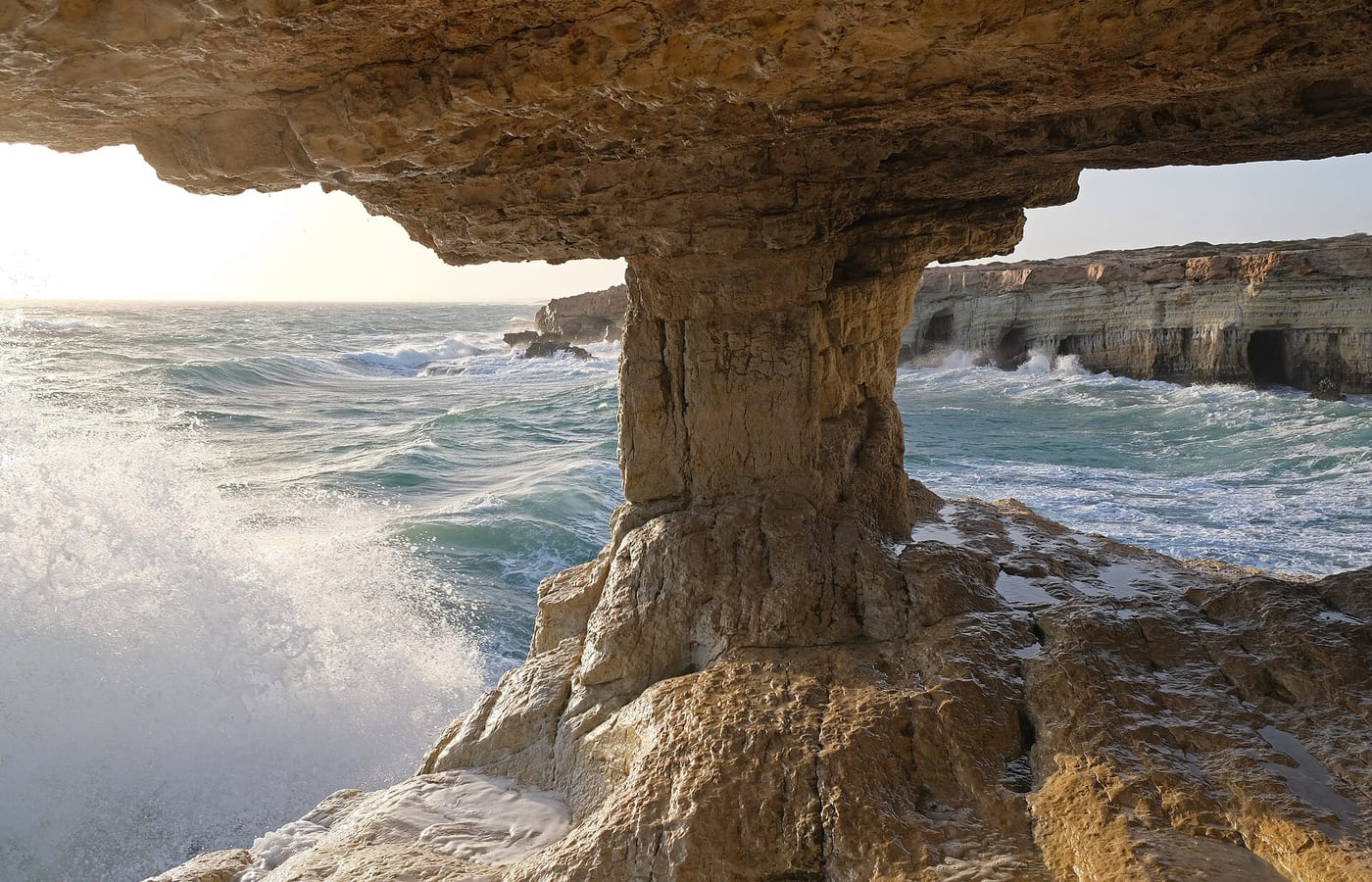 The white cliffs and sea caves of Cape Greco